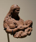 Bust_of_the_goddess_Isis_breastfeeding_her_son-brithis-museum-100dc